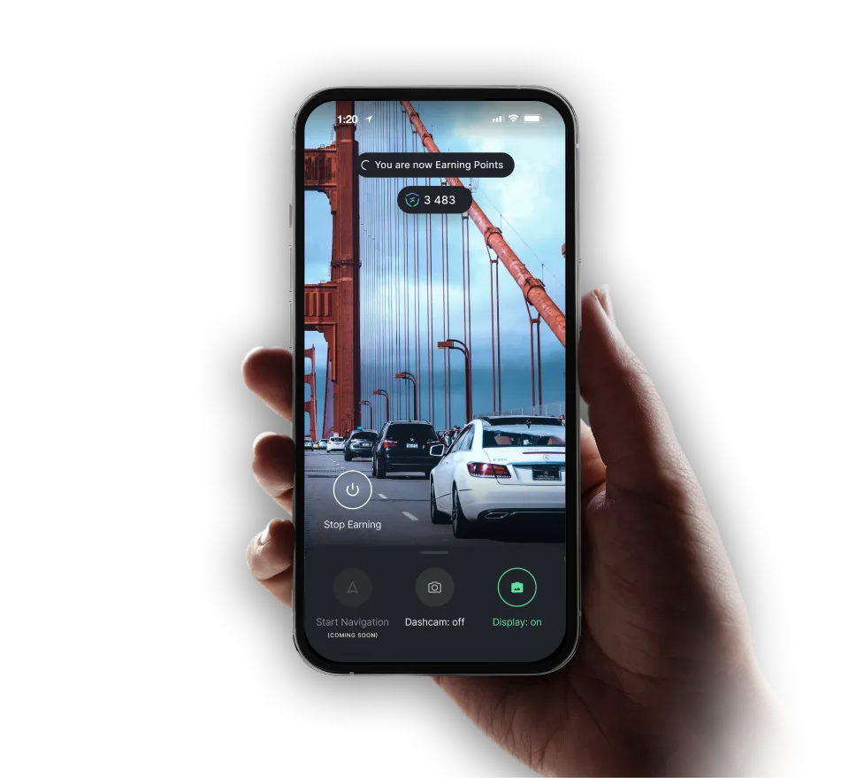 Smartphone displaying the interface of the Drive& app that allows you to earn Web3 crypto tokens